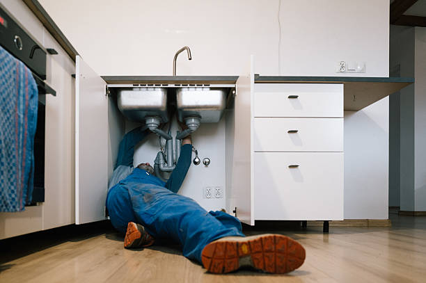 Professional Drain Cleaning technician working in Dadeville, MO